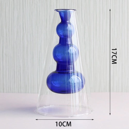 Glaskerzenhalter in geometrischen Formen
